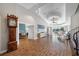 Expansive living room with high ceilings, waterfront views, a baby grand piano and elegant decor at 4803 Longwater Way, Tampa, FL 33615