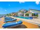 Backyard boasts pool, spa, lounge chairs and stunning waterfront views at 4803 Longwater Way, Tampa, FL 33615