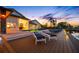 Stunning waterfront property featuring a beautiful pool and outdoor lounge area perfect for relaxation at 4803 Longwater Way, Tampa, FL 33615