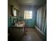 Bathroom showcasing a tiled shower, pink fixtures, and vintage decor at 5217 18Th S Ave, Gulfport, FL 33707