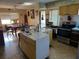 Spacious kitchen with an island, dining area, and stainless steel appliances at 5217 18Th S Ave, Gulfport, FL 33707