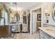 Bathroom with ornate vanity, a glass shower, and elegant decor at 525 Mandalay Ave # 33, Clearwater Beach, FL 33767