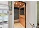 Interior elevator with metal lattice door at 525 Mandalay Ave # 33, Clearwater Beach, FL 33767