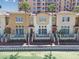 Waterfront townhomes feature private patios, lush landscaping, and stunning architectural design at 525 Mandalay Ave # 33, Clearwater Beach, FL 33767