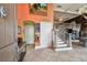 Inviting foyer with staircase, decorative artwork, and stylish accents at 525 Mandalay Ave # 33, Clearwater Beach, FL 33767