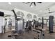 Well-equipped gym featuring modern exercise machines, mirrored walls, and ample workout space at 525 Mandalay Ave # 33, Clearwater Beach, FL 33767