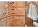 Detailed view of tiled shower with dual shower heads and built-in shelving at 525 Mandalay Ave # 33, Clearwater Beach, FL 33767