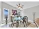 Dining room with modern furnishings, neutral walls and flooring, and bright natural light at 5317 Black Pine Dr, Tampa, FL 33624