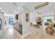 Open-concept kitchen with dark wood cabinets, granite countertops, and stainless steel appliances at 5317 Black Pine Dr, Tampa, FL 33624