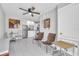 Open-concept living room with dining area and partial view of kitchen at 5317 Black Pine Dr, Tampa, FL 33624