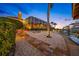 Well-maintained backyard with a screened pool area, a boat dock, and waterfront access at 5812 Mariners Watch Dr, Tampa, FL 33615
