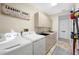 Convenient laundry room with modern appliances, ample counter space and lots of storage at 5812 Mariners Watch Dr, Tampa, FL 33615