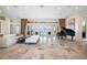 Bright and spacious living room with tile flooring and views of the outdoors and pool at 5812 Mariners Watch Dr, Tampa, FL 33615