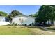 Charming single-story home featuring a spacious yard and a convenient driveway for easy parking at 6051 106Th N Ave, Pinellas Park, FL 33782