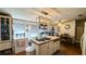 Well-lit kitchen with double sink island, ample counter space and decorative lighting at 6051 106Th N Ave, Pinellas Park, FL 33782