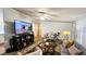 Spacious living room with comfortable seating, accent rugs and modern decor at 6051 106Th N Ave, Pinellas Park, FL 33782