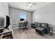Functional office with a sleek desk, leather sofa and a great window view at 6111 Hadley Commons Dr, Riverview, FL 33578