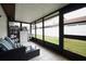 Spacious sunroom offering views of the yard and ample space for relaxation and enjoyment at 7360 Ulmerton Rd # 29B, Largo, FL 33771