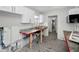 Kitchen shot during home remodel, with new floors, cabinets, and granite countertops at 810 Lantana Ave, Clearwater Beach, FL 33767