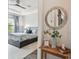 Bright bedroom featuring a stylish ceiling fan and elegant decor at 8725 Sorano Villa Dr, Tampa, FL 33647