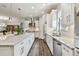 Spacious kitchen with a large island, granite countertops, and stainless steel appliances at 8725 Sorano Villa Dr, Tampa, FL 33647