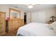 Comfortable bedroom featuring a ceiling fan, closet, and ample natural light at 9825 Casey Dr, New Port Richey, FL 34654
