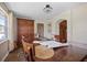 This dining room has stone floors, brick accents, and classic chandelier at 9825 Casey Dr, New Port Richey, FL 34654
