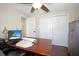 Bright office area with desk and windows, perfect for working at home at 9825 Casey Dr, New Port Richey, FL 34654
