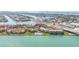 Waterfront condo community featuring boat docks, a community pool, tennis courts, and easy access to the ocean at 103 1St E St # 115, Tierra Verde, FL 33715