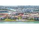 Beautiful waterfront condo community featuring a swimming pool, well-manicured lawns, and bay access at 103 1St E St # 115, Tierra Verde, FL 33715
