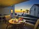 Enjoy the sunset view from this cozy balcony with poolside and ocean scenery at 103 1St E St # 115, Tierra Verde, FL 33715