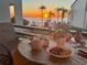 Enjoy breathtaking waterfront sunset views from your private balcony, perfect for dining al fresco at 103 1St E St # 115, Tierra Verde, FL 33715