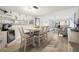 Open-concept floor plan with modern furnishings and an inviting living area at 103 1St E St # 115, Tierra Verde, FL 33715