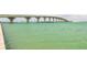 Open view of the water with a bridge in the distance at 103 1St E St # 115, Tierra Verde, FL 33715