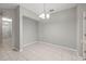 Dining area with tile floors, modern chandelier, and easy access to other living spaces at 10418 Tulip Field Way, Riverview, FL 33578
