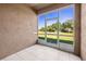 Screened patio overlooking a verdant green space and boasting ample natural light at 10418 Tulip Field Way, Riverview, FL 33578