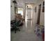 Bright entryway featuring tile floors and an arched doorway, creating a welcoming space with ample natural light at 1061 6Th Nw St, Largo, FL 33770