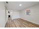 Bedroom with a large closet, wood floors, and a window with natural light at 11347 Amboy St, Spring Hill, FL 34609