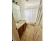 Traditional bathroom features a single sink, toilet, and shower with a curtain at 12814 Longcrest Dr, Riverview, FL 33579