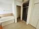 Bathroom featuring a soaking tub, a tiled shower, and lots of natural light at 12814 Longcrest Dr, Riverview, FL 33579