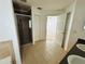 Large bathroom with tile flooring, standing shower and double sinks at 12814 Longcrest Dr, Riverview, FL 33579