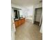 Bathroom featuring double sinks, a soaking tub, and tile flooring at 12814 Longcrest Dr, Riverview, FL 33579
