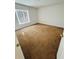 Bedroom with neutral carpet, white walls, and a window at 12814 Longcrest Dr, Riverview, FL 33579