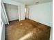 Bedroom with large closet, carpet floors and white walls at 12814 Longcrest Dr, Riverview, FL 33579
