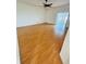 Bright bedroom with hardwood floors and a large window at 12814 Longcrest Dr, Riverview, FL 33579