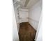 Walk-in closet featuring built in shelving and carpet flooring at 12814 Longcrest Dr, Riverview, FL 33579