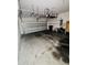 View of the spacious two car garage featuring overhead storage racks at 12814 Longcrest Dr, Riverview, FL 33579