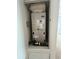 Image of a Carrier brand HVAC system located inside a closet-like space within the home at 12814 Longcrest Dr, Riverview, FL 33579