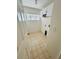 Bright laundry room with tile flooring, white cabinets, and washer/dryer hookups at 12814 Longcrest Dr, Riverview, FL 33579