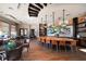 Elegant clubhouse interior featuring a bar, dining area, and large windows at 13917 Kingfisher Glen Dr, Lithia, FL 33547